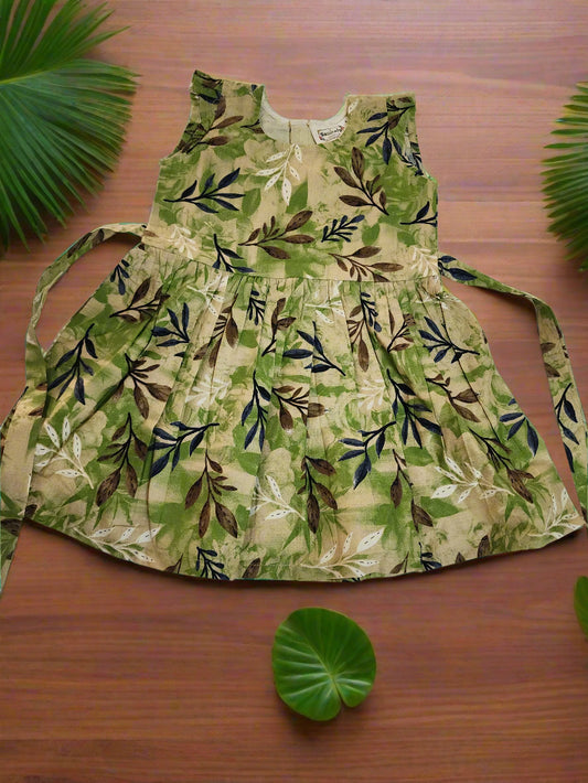 Green leaf-patterned apron on a white background