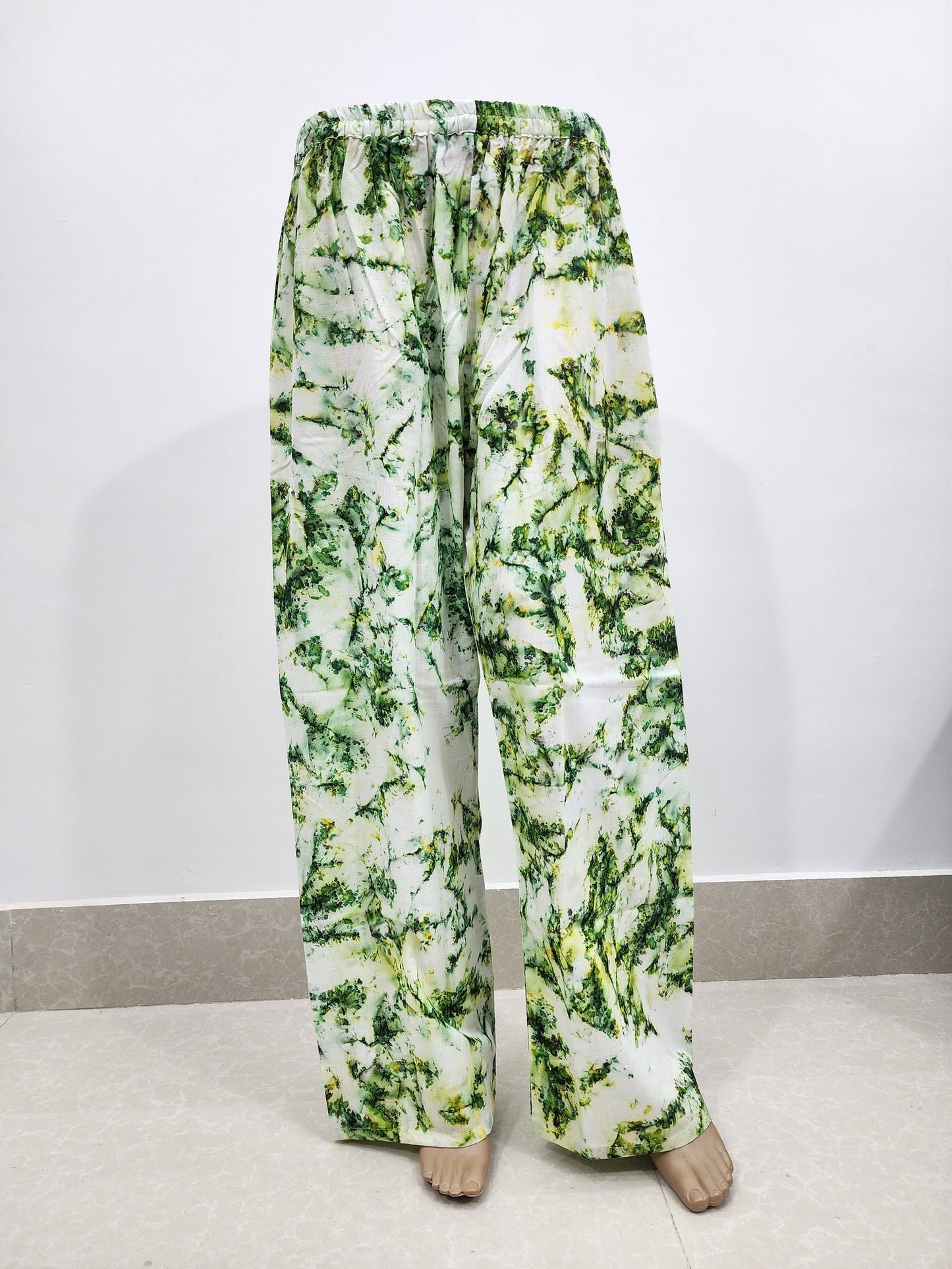 Floral patterned pants on a white background