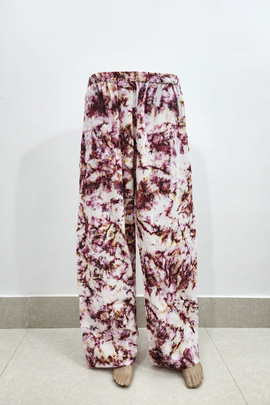 Floral patterned pants on a white background