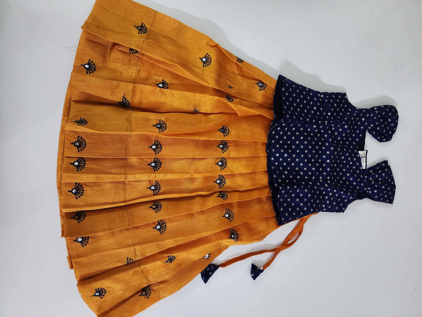 Pretty Blue crop top with yellow lehenga.