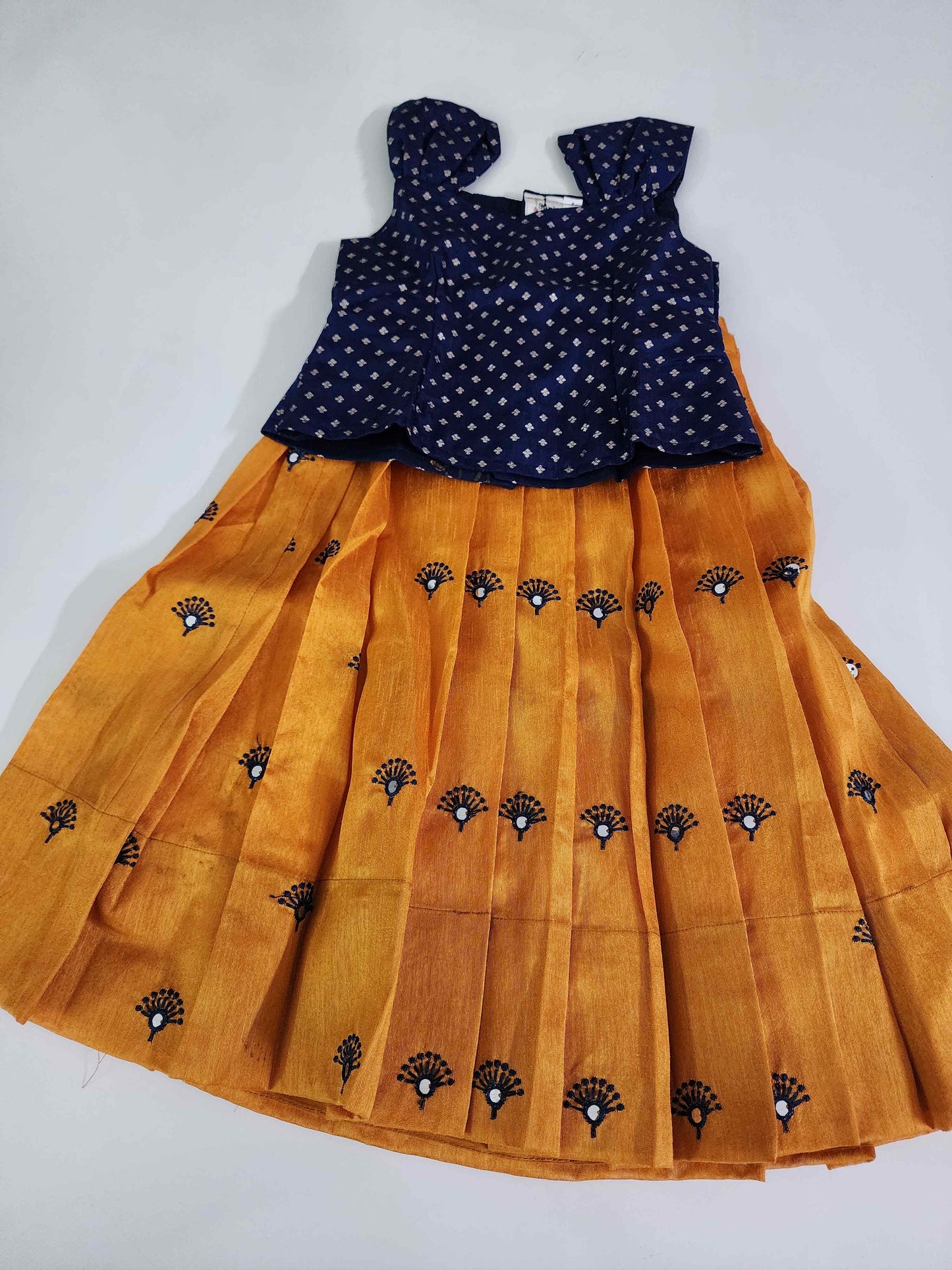 Pretty Blue crop top with yellow lehenga.