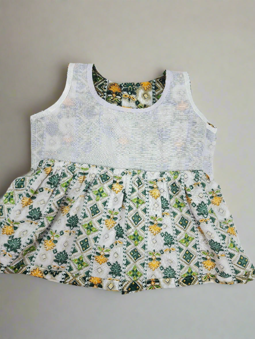 Floral dress with a patterned skirt on a light gray background