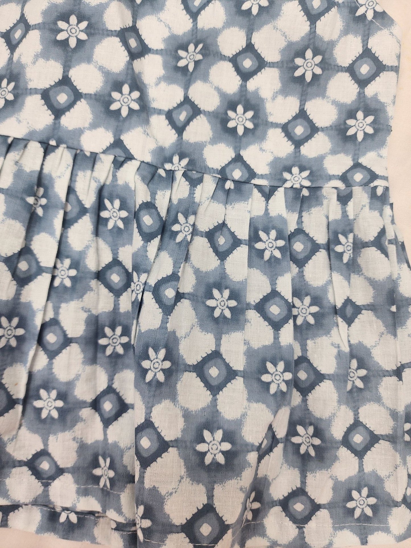 Fabric with blue and white floral pattern