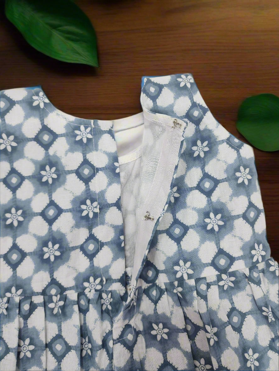 Blue and white patterned garment on a beige background