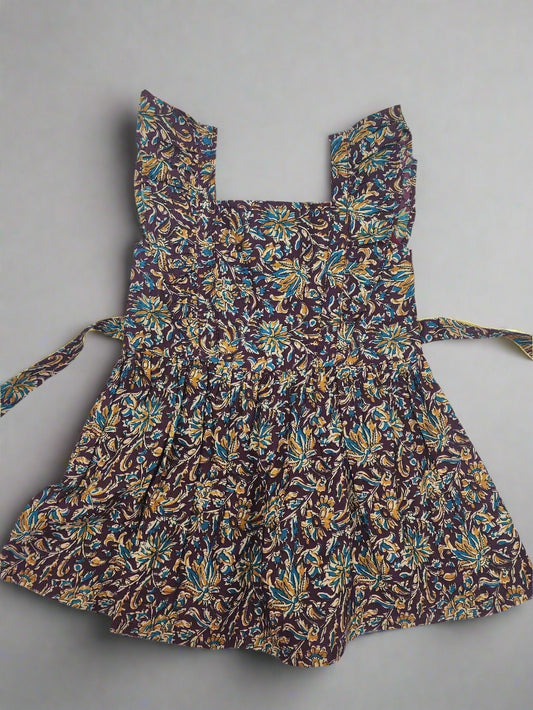 Floral patterned apron on a white background