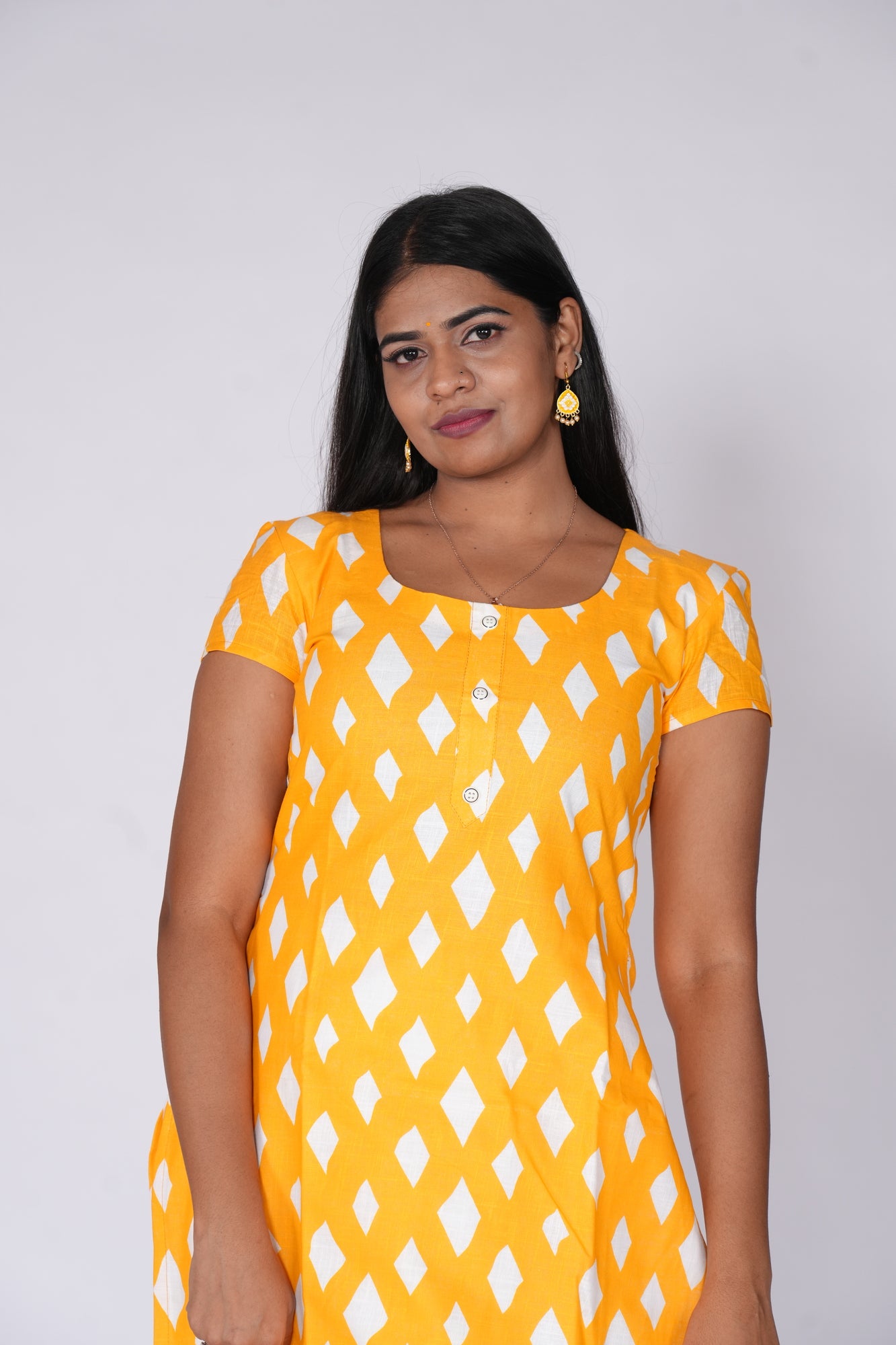 Yellow kurti with diamond print
