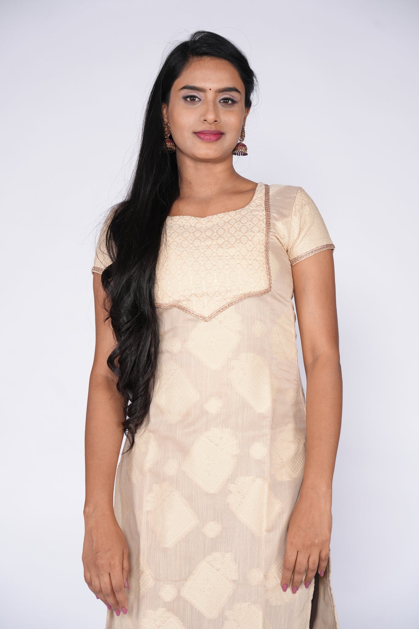 Cream Chikankari Self highlight Kurti