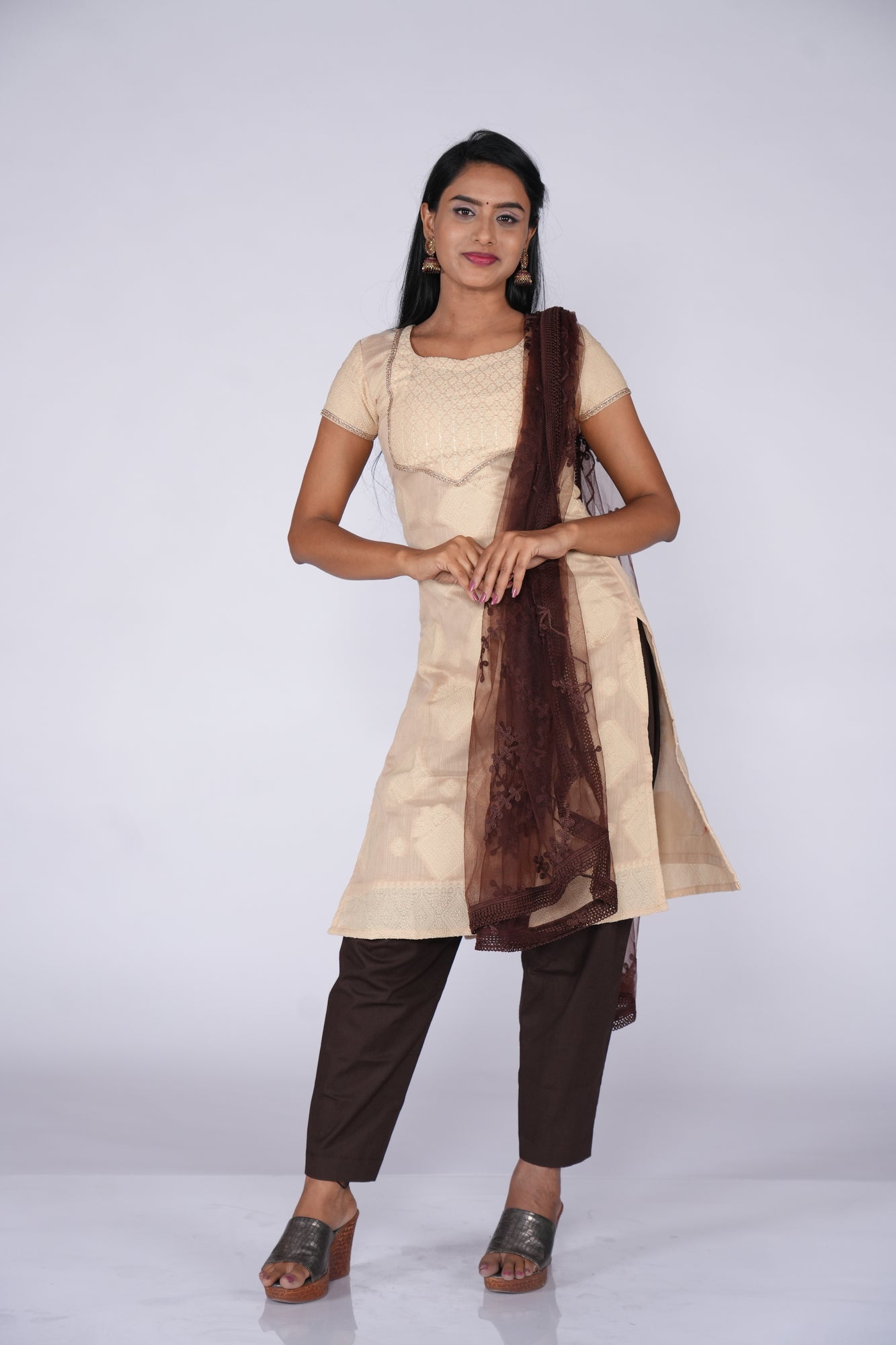 Cream Chikankari Self highlight Kurti