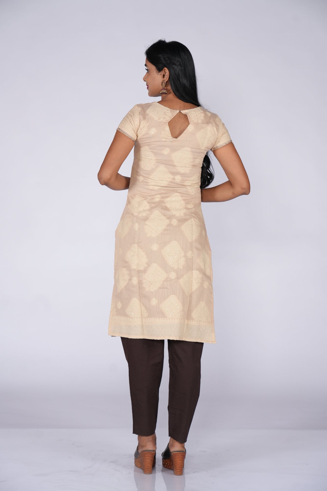 Cream Chikankari Self highlight Kurti