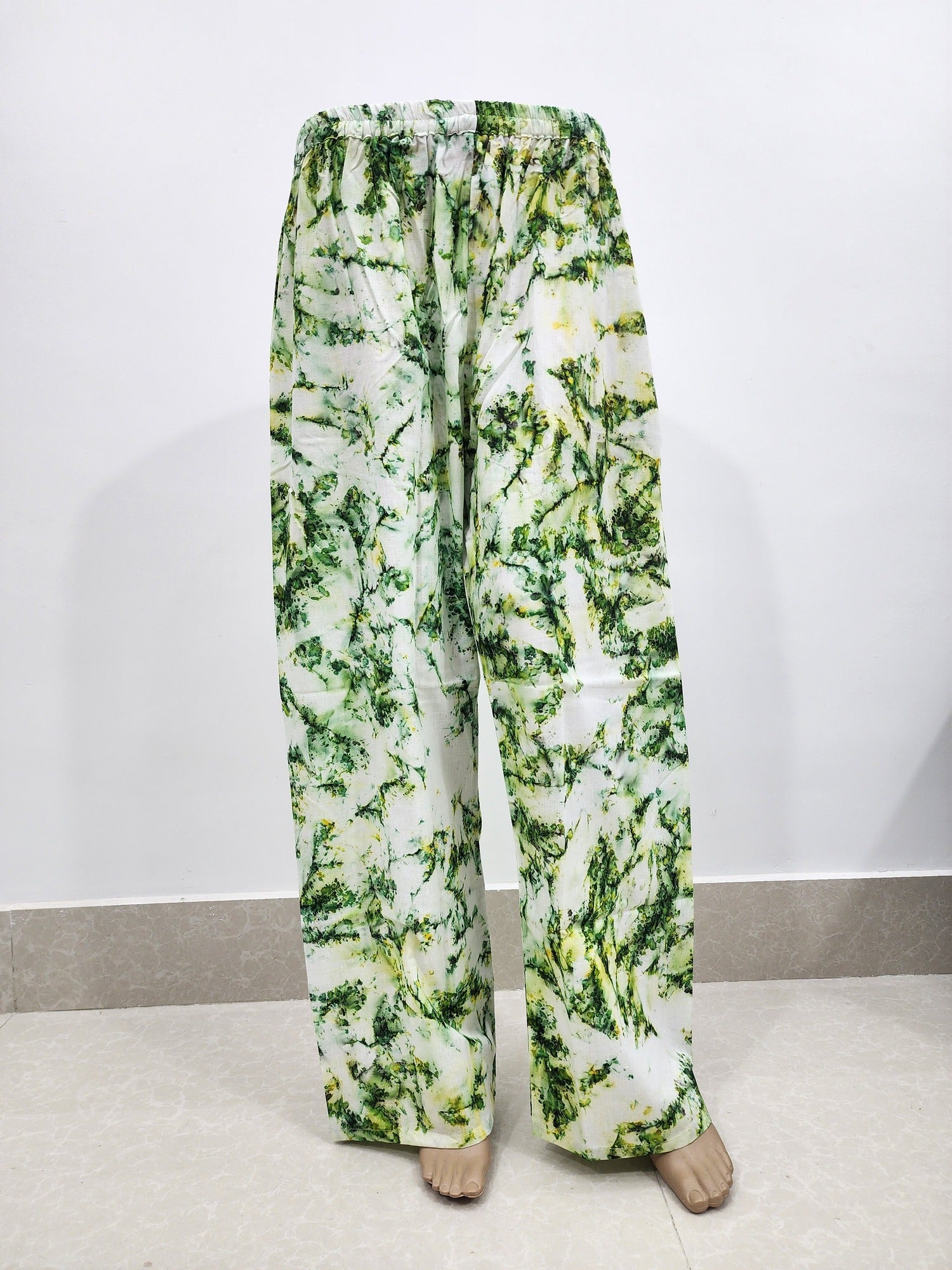 Floral patterned pants on a white background