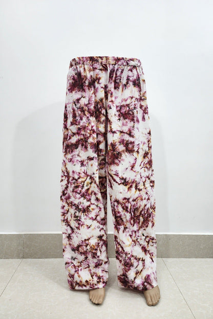 Floral patterned pants on a white background