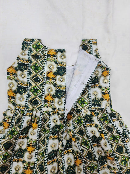 Embroidered garment with intricate patterns on a white background
