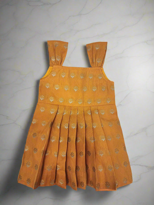 Yellow dress with floral pattern on a white background