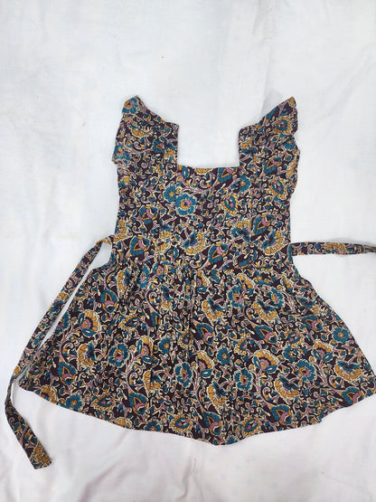 Floral patterned frock on a white background