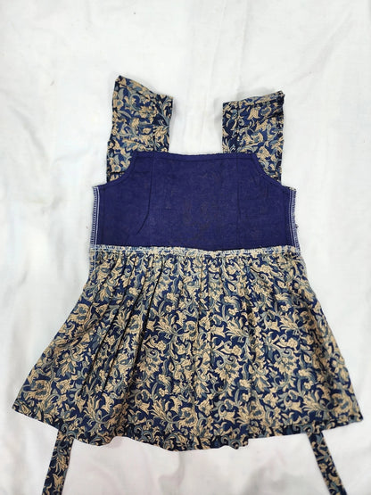 Blue dress with floral patterns on a white background