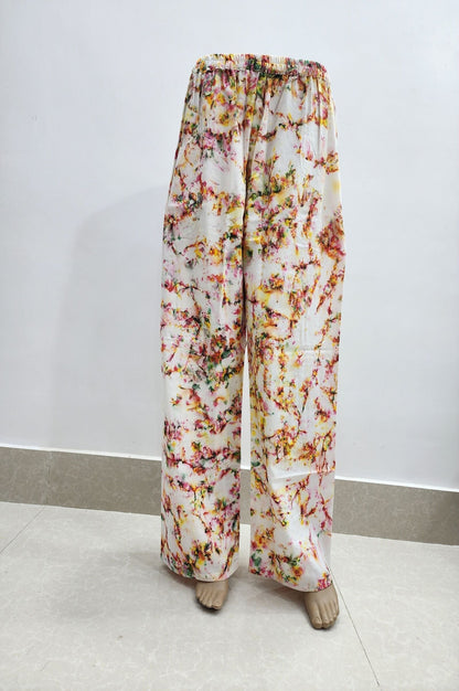 Floral-patterned pants on a white background